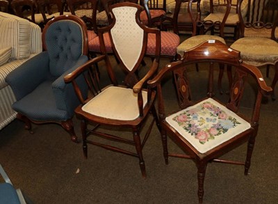 Lot 553 - A Victorian mahogany button back armchair, an Edwardian shield shaped armchair and an inlaid corner