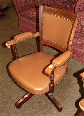 Lot 557 - A 19th century mahogany framed brown leather upholstered office chair