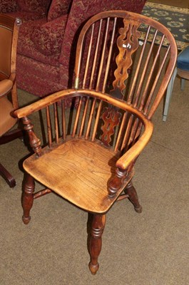 Lot 558 - A mid 19th century Yewwood double spindle back armchair, Yorkshire/Cheshire region, with double...