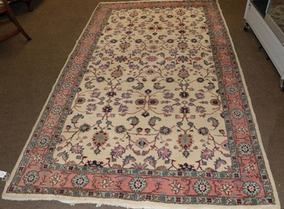 Lot 561 - Isfahan carpet, the ivory field of vines enclosed by floral borders, 266cm by 159cm