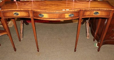 Lot 570 - A Chapman's of Newcastle reproduction mahogany serving table