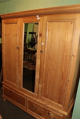 Lot 583 - A Victorian pine double door wardrobe