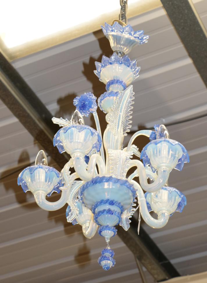 Lot 606 - A Murano blue smoked glass five-light chandelier