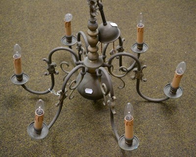 Lot 607 - A Dutch style brass six branch chandelier