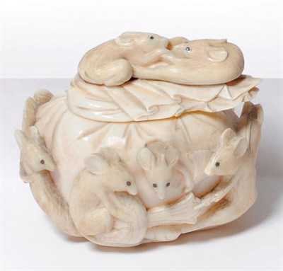 Lot 214 - A Japanese Carved Ivory Small Box and Cover, circa 1930, fashioned as a silken bag and cover,...