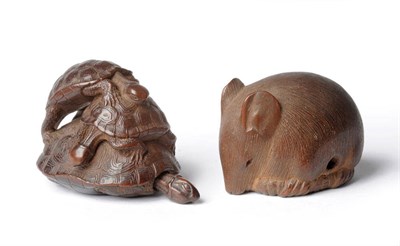 Lot 219 - A Japanese Carved Wood Netsuke as a Crouched Rat, 19th century, naturalistically observed, its tail