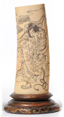 Lot 225 - A Japanese Carved Elephant Tusk Section Vase, Meiji period (1868-1912), incuse carved with a figure