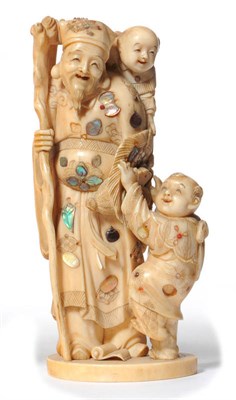 Lot 228 - A Japanese Carved Ivory and Shibayama Inlaid Figure Group, Meiji period (1868-1912), carved as...