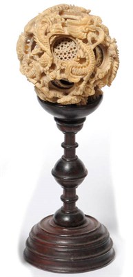 Lot 236 - A Chinese Export Carved Elephant Ivory Concentric Puzzle Ball, circa 1860, of eleven spheres,...