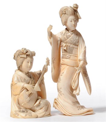 Lot 243 - A Japanese Carved Ivory Figure of a Musician, Meiji period (1868-1912), the kneeling girl in...