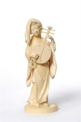 Lot 249 - A Japanese Carved Ivory Figure of a Girl, Meiji period (1868-1912), standing, her hair tied up...