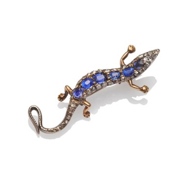 Lot 251 - A Late Victorian Lizard Brooch, set with cushion cut sapphires and rose cut diamonds...