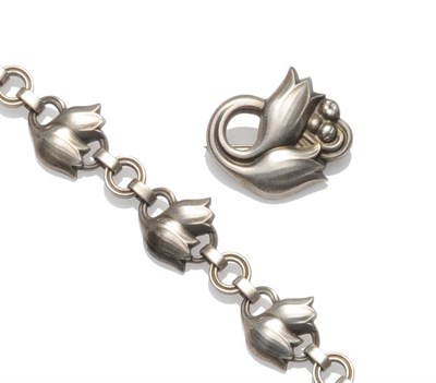 Lot 252 - A Silver Bracelet, by Georg Jensen, of floral motifs, numbered '100A', length 18.2cm, and A Brooch