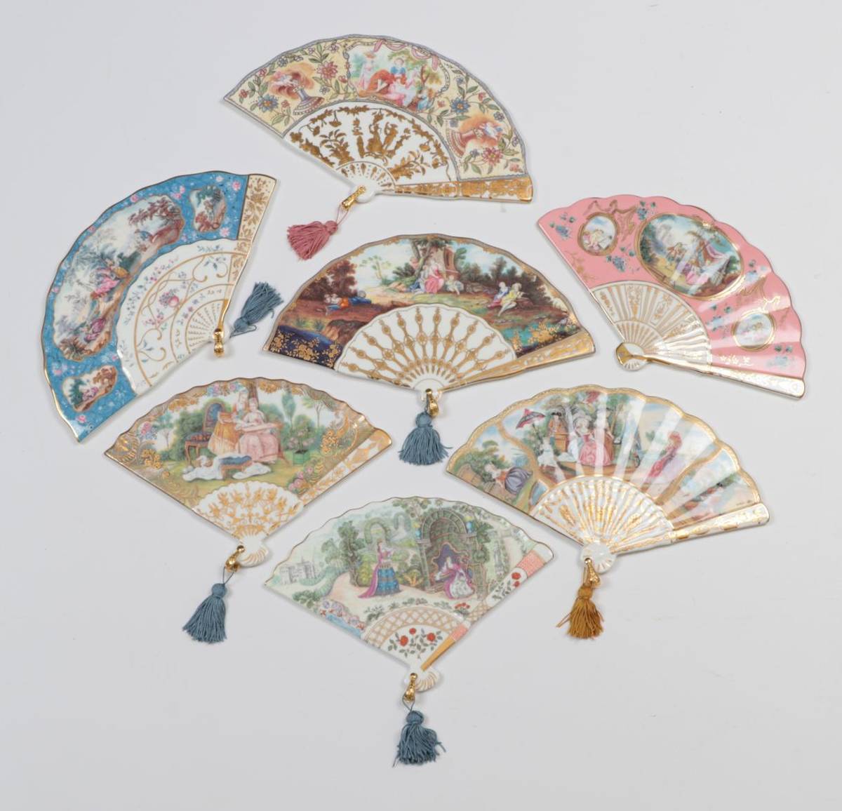 Lot 2014 - Seven Porcelain Fan Shaped Decorative Plates, ''The Fans of the Fitzwilliam Museum'' by Compton and