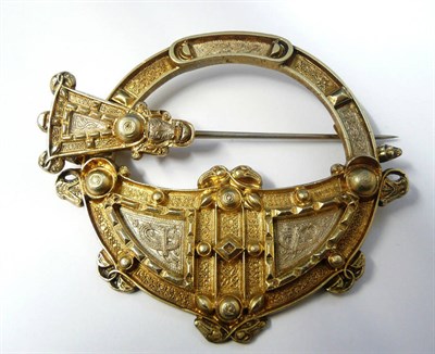 Lot 265 - An Irish Parcel Gilt Metal Celtic Revival Plaid Brooch, 19th century, of circular form...