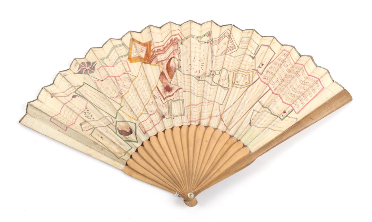 Lot 2021 - A Conundrum Fan, an English etched and hand coloured fan dated 1791, the upper central border...