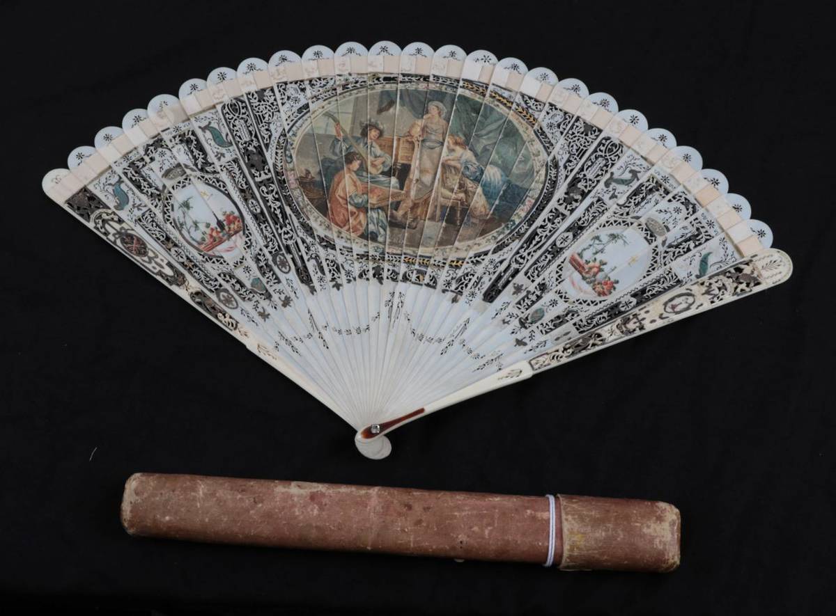 Lot 2026 - A Large 18th Century Ivory Brisé Fan, European, carved, pierced, silvered and painted. The central