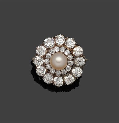 Lot 266 - A Victorian Pearl and Diamond Brooch, the pearl within a double border of graduated old...