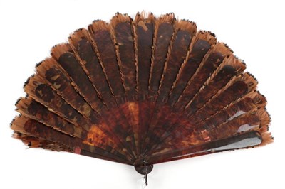 Lot 2035 - A Good Pheasant Feather Fan, circa 1880's, the monture a large brisé fan in tortoiseshell,...