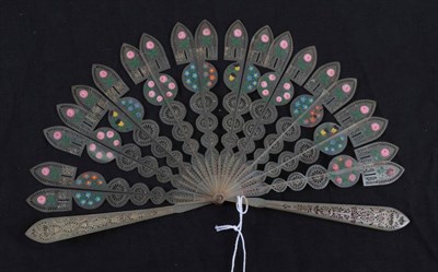 Lot 2045 - A Good Early 19th Century Horn Brisé Fan, barrel rivet, the sticks carved and pierced and...