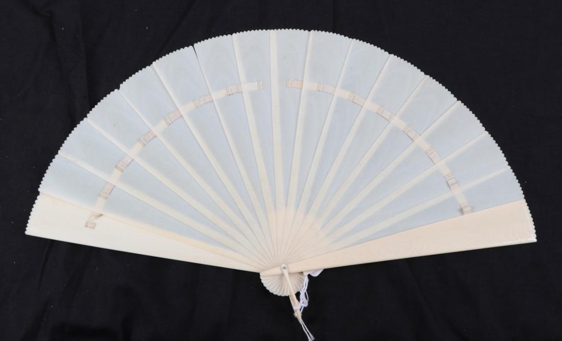 Lot 2046 - A Circa 1880's Ivory Brisé Fan, with wide wedge-shaped sticks, completely plain save for a...