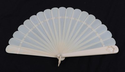 Lot 2054 - A Circa 1880's Ivory Brisé Fan, the upper guard heavily carved with a winged Angel carrying a...