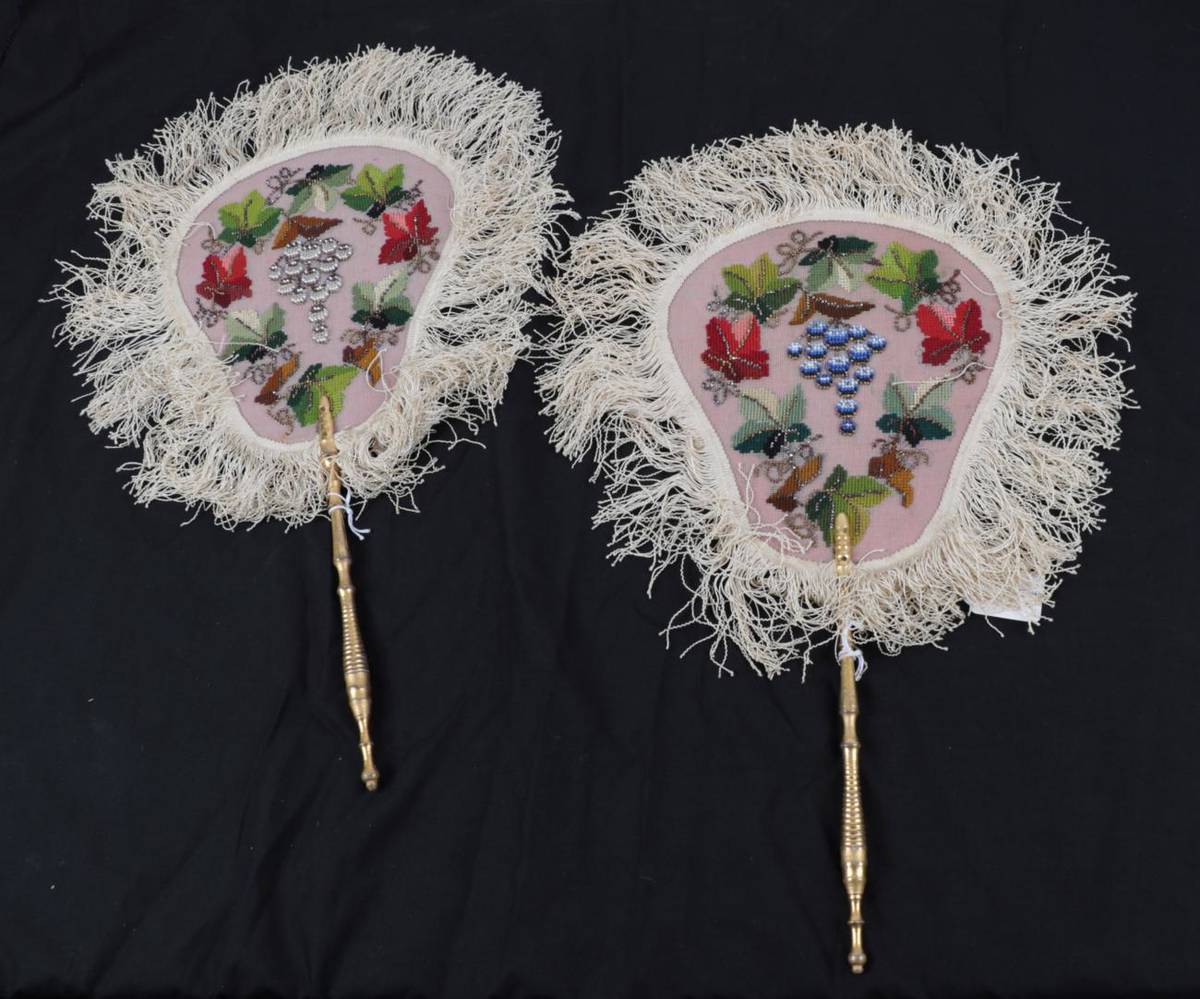 Lot 2058 - A Pair of Mid-19th Century Embroidered Face Screens, a fine canvas panel embroidered with...