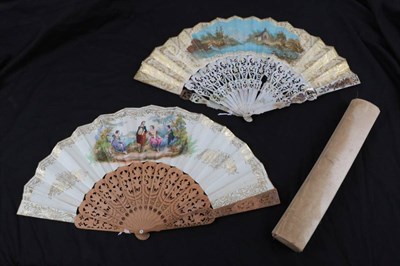 Lot 2064 - A Mid-19th Century White Mother-of-Pearl Fan, the guards and deep gorge carved and pierced,...