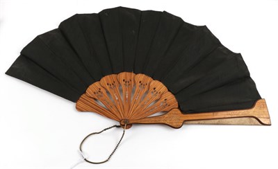 Lot 2075 - The 1890's: Two Large Late 19th Century Fans, one embroidered on dark cream silk, a spray of...