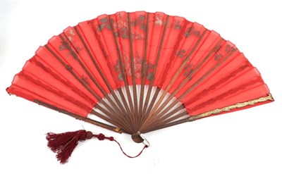 Lot 2077 - Two Vibrant Late 19th Century Fans, the first a strong red gauze painted with blossom and...