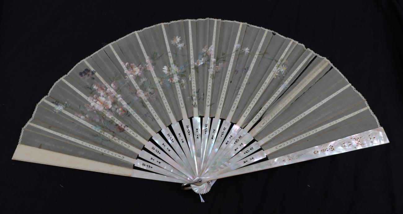 Lot 2081 - Two Attractive Large Late 19th Century Fans, the montures of mother-of-pearl. The first, in...