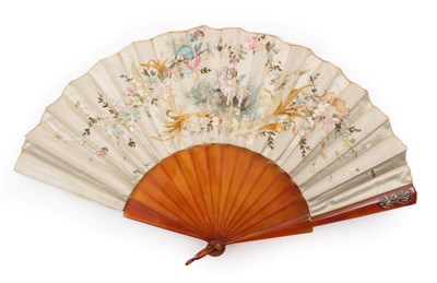 Lot 2090 - An Embroidered Fan, circa 1900, the double silk leaf mounted on resin sticks, tan in colour,...