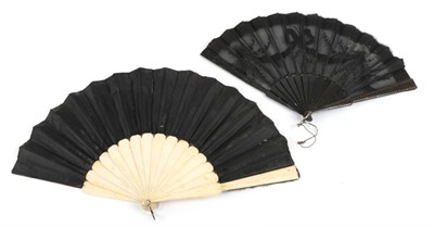 Lot 2091 - Four 19th to Early 20th Century Fans, comprising a pink mother-of-pearl example mounted with a...