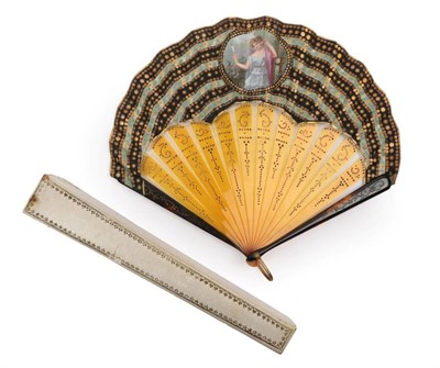 Lot 2093 - Circa 1910, An Unusual Tortoiseshell Fan of Ballon Form, the guards dark and mottled, the gorge...