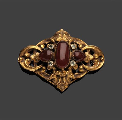 Lot 273 - A Victorian Garnet and Chrysoberyl Brooch, three foil backed garnets set with chrysoberyl...