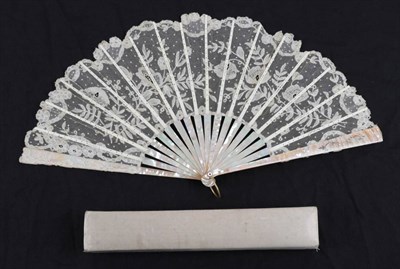 Lot 2118 - A Circa 1900 Brussels Mixed Lace Fan, the leaf mounted on pink Mother-of-pearl, and lightly...