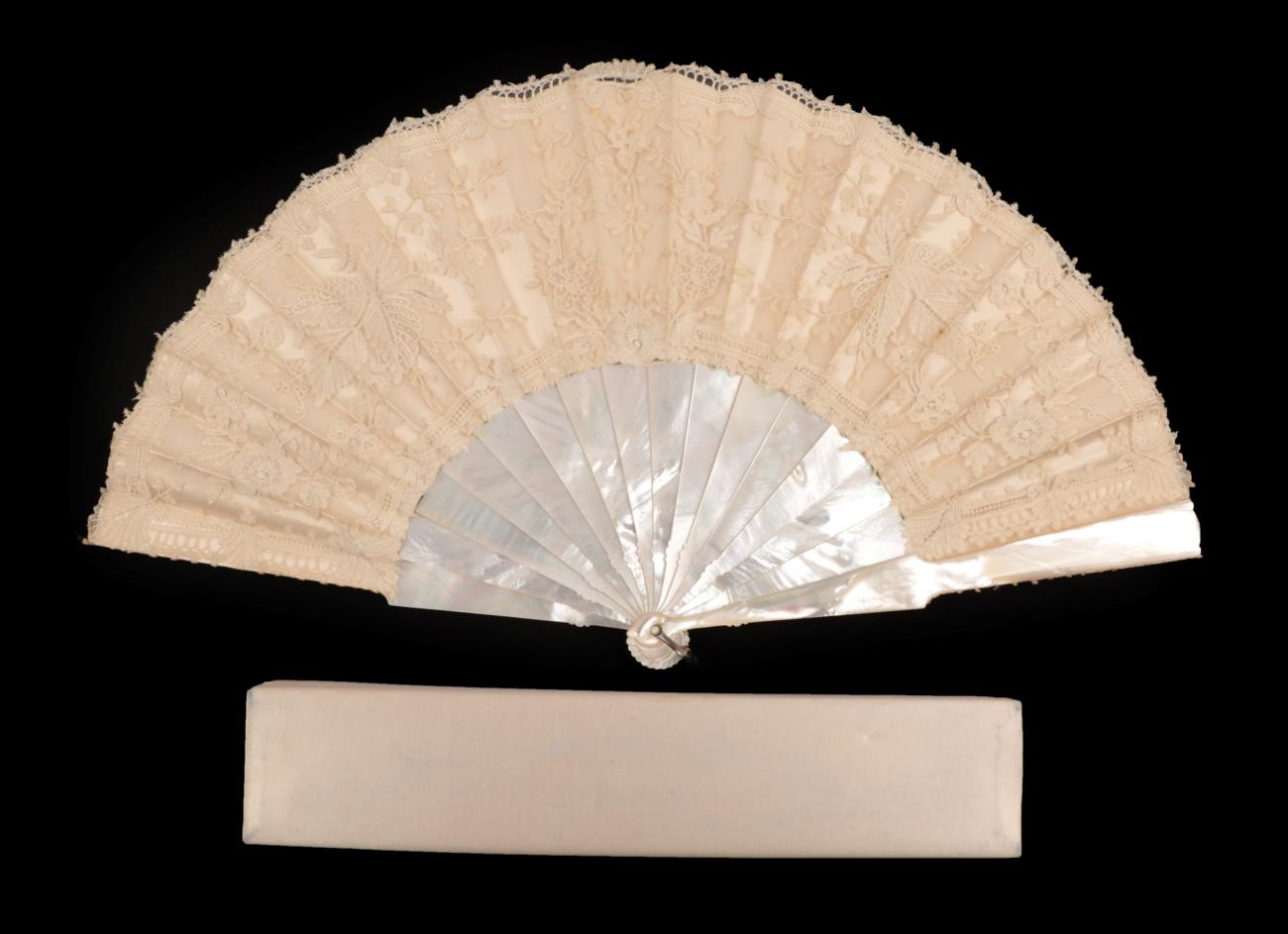 Lot 2124 - A Good Mixed Brussels Appliqué Lace Fan, the monture of white mother of pearl with some attractive