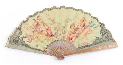 Lot 2144 - Cherubs and Black Lace: A Late 19th Century Printed Fan, the double paper leaf mounted on pale...