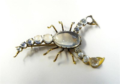 Lot 278 - A Scorpion Brooch, claw set with moonstones throughout (one missing), measures 4.2cm by 2.8cm...