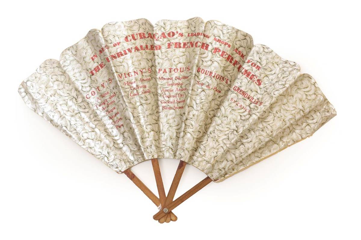 Lot 2194 - French Perfumes In Curacao: An Unusual Printed Paper Advertising Fan From Curacao, suggesting...