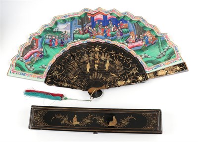 Lot 2208 - A Boxed Chinese Mandarin Fan, Qing Dynasty, the monture of wood lacquered in black and gold....