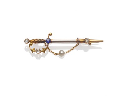 Lot 289 - A Miniature Sword Brooch, the two colour piece set with a sapphire and three old cut diamonds,...