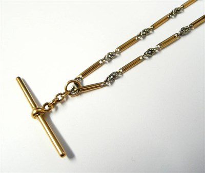 Lot 295 - A Fancy Albert Chain, yellow bar links and white rope effect links alternate, hung with a...