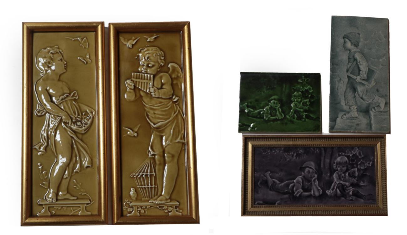 Lot 3513 - Two Craven Dunnill & Co Limited Rectangular Plaques, moulded with a cherub and a child, mustard...