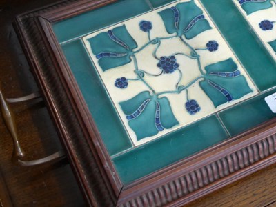 Lot 3524 - An Art Nouveau Shapland & Petter of Barnstaple Oak Tray, inset with three stylised flowering...