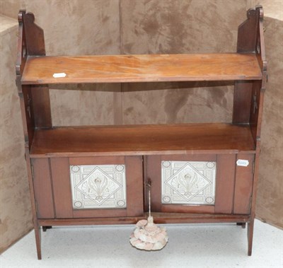 Lot 3526 - A Late Victorian Mahogany Hanging Shelf Cupboard, with fret cut sides, the single shelf above...