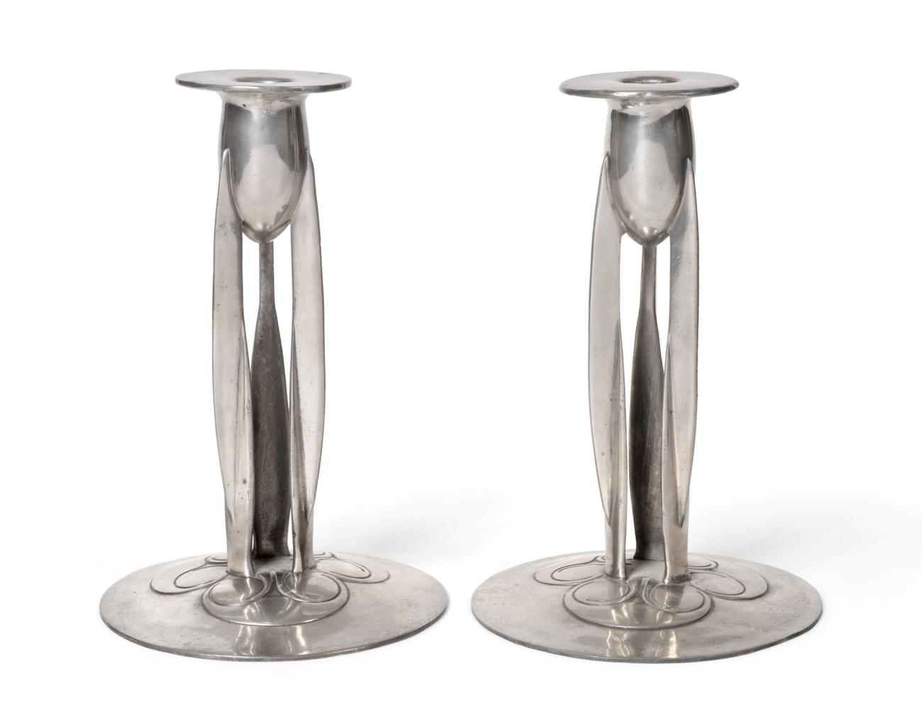 Lot 3563 - Archibald Knox (1864-1933) for Liberty & Co: A Pair of Tudric Pewter Candlesticks, model...