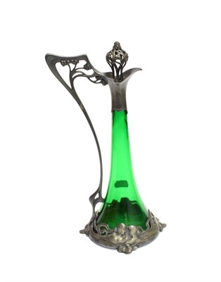 Lot 3565 - An Art Nouveau WMF Claret Jug and Stopper, No.191, with tapering green glass body, the plated...