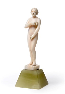 Lot 3569 - An Art Deco Ivory Figure, of a nude maiden with a butterfly, on a green onyx base, unsigned, 12.5cm
