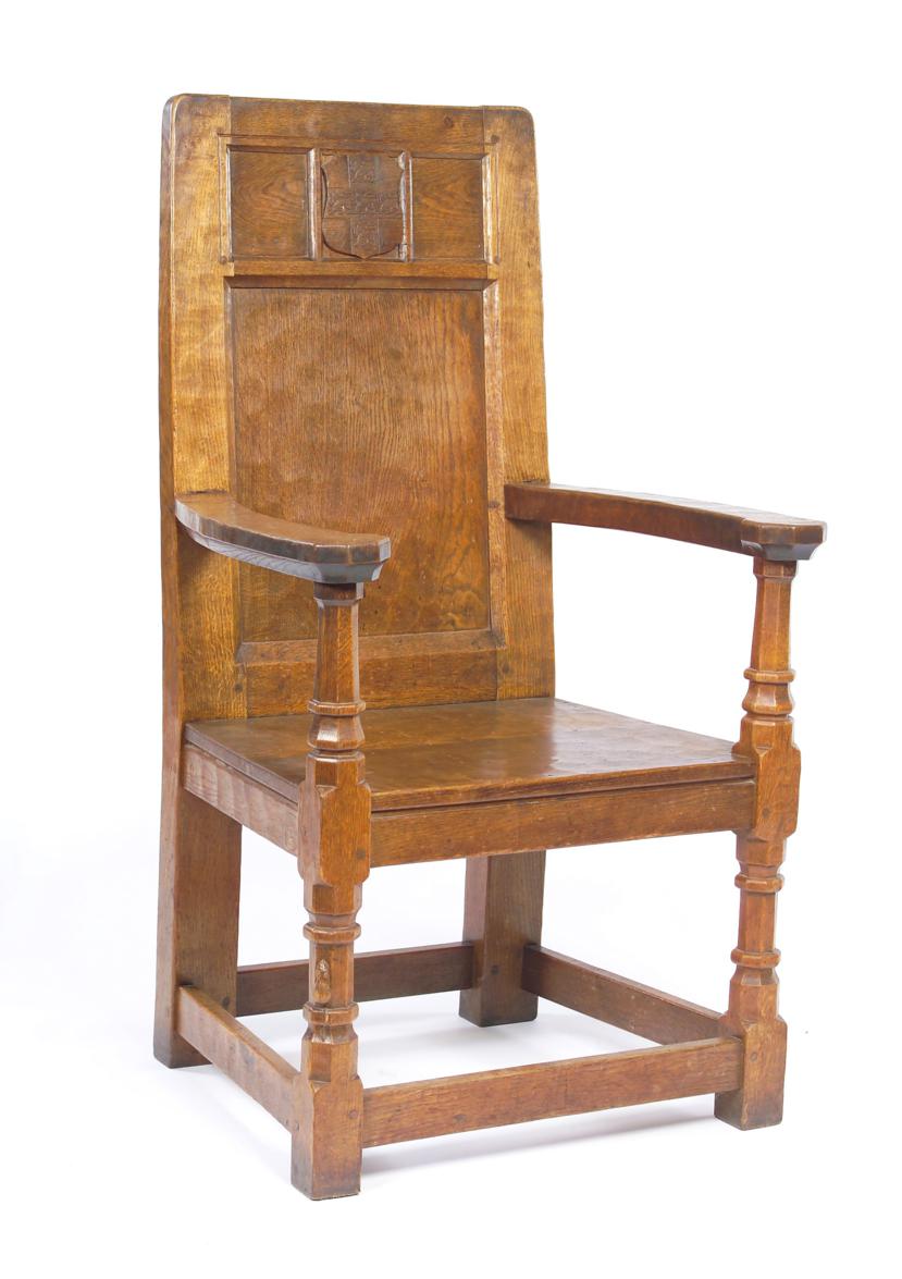 Lot 3585 - Mouseman: A Robert Thompson of Kilburn English Oak Bishop's Chair, circa 1939, the adzed back panel